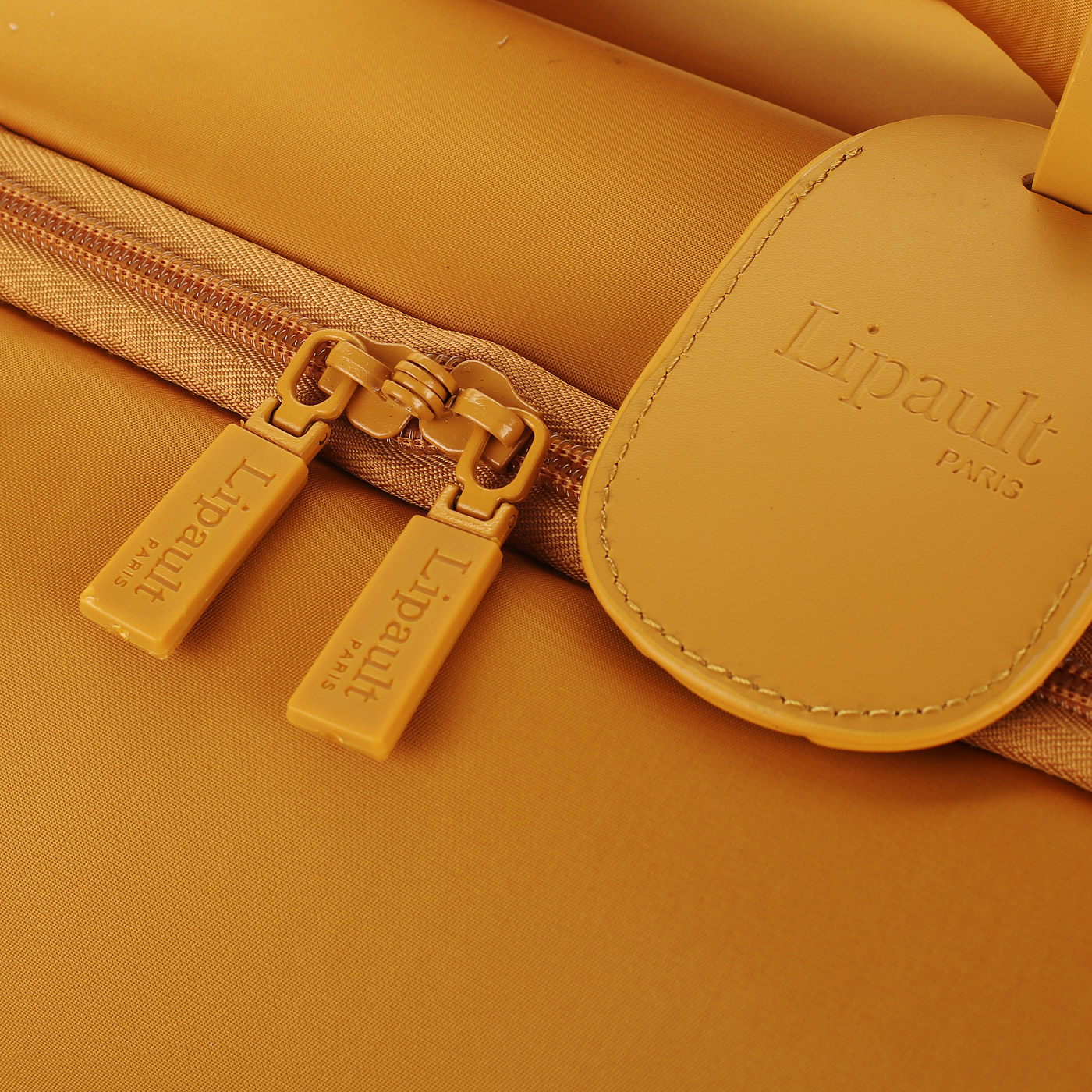 Чемодан маленький S тканевый с кодовым замком Lipault Plume